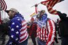 Rioters shout at the U.S. Capitol on Jan. 6, 2021, in Washington. The Jan. 6, 2021 insurrection at the U.S. Capitol played out for the world to see. But the House committee investigating the attack believes a more chilling story has yet to be told. (AP Photo/Julio Cortez)