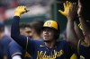 Milwaukee Brewers' Willy Adames celebrates his two-run home run during the fifth inning of a baseball game against the Washington Nationals, Sunday, June 12, 2022, in Washington. (AP Photo/Nick Wass)
