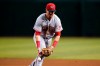 Cincinnati Reds second baseman Matt Reynolds is unable to make a play on an infield hit by Arizona Diamondbacks' Alek Thomas during the fourth inning of a baseball game Monday, June 13, 2022, in Phoenix. (AP Photo/Ross D. Franklin)