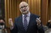 Minister of Justice and Attorney General of Canada David Lametti rises during Question Period, Thursday, June 2, 2022 in Ottawa. Liberal Justice Minister David Lametti is expected to table a bill as early as Friday that would respond to a Supreme Court ruling to allow voluntary extreme intoxication as a defence for serious crimes.THE CANADIAN PRESS/Adrian Wyld