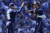 Chicago Cubs' P.J. Higgins, left, celebrates with Christopher Morel after they defeated the Atlanta Braves in a baseball game in Chicago, Friday, June 17, 2022. (AP Photo/Nam Y. Huh)