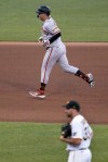 San Francisco Giants' Joc Pederson, top, runs the bases after hitting a solo home run off Pittsburgh Pirates starting pitcher Zach Thompson, foreground, during the fourth inning of a baseball game in Pittsburgh, Friday, June 17, 2022. (AP Photo/Gene J. Puskar)