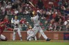 Milwaukee Brewers' Keston Hiura (18) hits a two-run home run in the ninth inning during a baseball game against the St. Louis Cardinals on Friday, May 27, 2022, in St. Louis. (AP Photo/Michael B. Thomas)