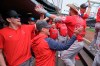 Los Angeles Angels' Mike Trout, right, is greeted in the dugout after hitting a two-run home run on a pitch from Seattle Mariners starting pitcher Logan Gilbert during the fourth inning of a baseball game, Sunday, June 19, 2022, in Seattle. (AP Photo/John Froschauer)