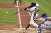 Pittsburgh Pirates' Bligh Madris (66) singles off Chicago Cubs starting pitcher Caleb Kilian, driving in two runs during the second inning of a baseball game in Pittsburgh, Monday, June 20, 2022. (AP Photo/Gene J. Puskar)