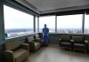 A registered nurse who has been redeployed from the operating room to the intensive care unit, looks out the window in the ICU at the Humber River Hospital in Toronto on Tuesday, April 13, 2021. THE CANADIAN PRESS/Nathan Denette