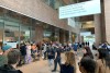 People wait in the line outside the Passport Canada office in downtown Montreal, June 21, 2022.  THE CANADIAN PRESS/Jacob Serebrin