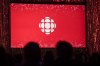 The CBC logo is projected onto a screen in Toronto on May 29, 2019. THE CANADIAN PRESS/Tijana Martin