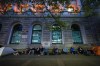 People camp out overnight in line outside a Service Canada passport office, in Vancouver, on Wednesday, June 22, 2022. THE CANADIAN PRESS/Darryl Dyck