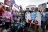 A celebration outside the Supreme Court, Friday, June 24, 2022, in Washington. The Supreme Court has ended constitutional protections for abortion that had been in place nearly 50 years — a decision by its conservative majority to overturn the court's landmark abortion cases. (AP Photo/Steve Helber)