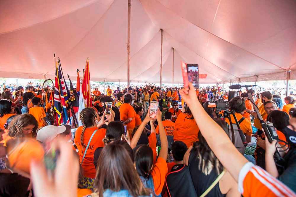 MIKAELA MACKENZIE / WINNIPEG FREE PRESS  

People crowd around the tent at a Pow Wow at St. John's Park on the first National Day for Truth and Reconciliation in Winnipeg on Thursday, Sept. 30, 2021.