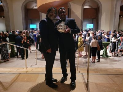 NCM founder and publisher, George Abraham, poses with his award and with chair of the NCM board, Gavin Barrett, at the CJF Awards hosted at the Art Gallery of Ontario in Toronto Tuesday evening. Photo courtesy: Lauren Botha