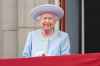 Queen Elizabeth II watches from the balcony of Buckingham Place after the Trooping the Color ceremony in London, Thursday, June 2, 2022, on the first of four days of celebrations to mark the Platinum Jubilee. The events over a long holiday weekend in the U.K. are meant to celebrate the monarch's 70 years of service. (Jonathan Brady/Pool Photo via AP)