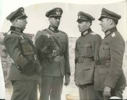 Winnipeg Free Press Archives
Nazi officers discuss further moves in the occupation in a conference outside the fort on If Day.