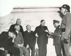 Winnipeg Free Press Archives
A Nazi officer reads charges to provincial cabinet minister Errick Willis (from left), premier John Bracken., cabinet minister J. S. McDiarmid, cabinet minister James McLeneghan and Winnipeg mayor John Queen after confining them to the dungeon.