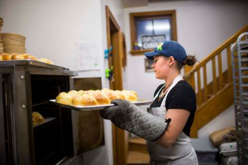 Brittney Albanese turns the challah.