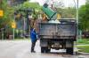 MIKAELA MACKENZIE / WINNIPEG FREE PRESS
Garrett LeBlanc, compost courier with Compost Winnipeg, dumps a bin into the truck in Winnipeg.