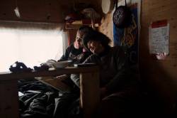 Amber Bracken photo
Gitxsan supporter Shaylynn Sampson, of Lax Gibuu Wilp Spookxw, and Sleydo’ rest at Coyote Camp on Nov. 18..