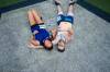 ETHAN CAIRNS / WINNIPEG FREE PRESS
Runners flop down on IG Field to cool off and relax after they finish the Manitoba Half Marathon, which was cancelled due to extreme heat Sunday.