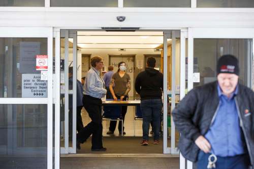 Health-care workers screen every person who enters Grace Hospital. (Mike Deal / Winnipeg Free Press)