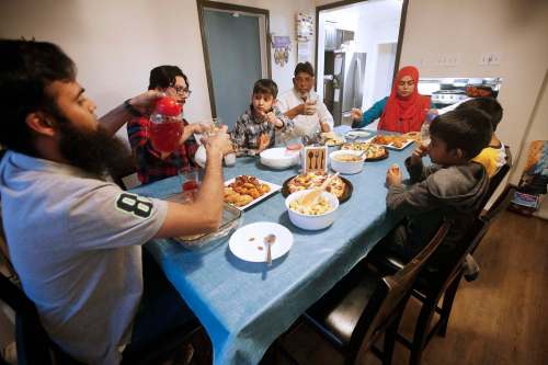 Urooj Danish and her family break their Ramadan fast with prayers and an iftar meal at sundown. (John Woods / Winnipeg Free Press)