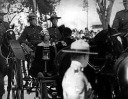 Tree-shaded Broadway Boulevard was lined 20 deep with cheering crowds on July 15, 1970 as Queen Elizabeth II and Prince Philip drove in an open carriage escorted by horsemen of RCMP Musical Ride to the legislature building for Manitoba Centennial Day Ceremonies. (Peter Bregg / The Canadian Press files)