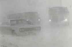 Traffic on Portage Avenue at Polo Park at 8:30 a.m. was barely visible.  (Jack Ablett / Winnipeg Free Press Archives)