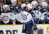 CP
Winnipeg Jets defenseman Dustin Byfuglien (33) is congratulated after scoring a goal against the Nashville Predators during the second period in Game 5 of an NHL hockey second-round playoff series Saturday, May 5, 2018, in Nashville, Tenn. (AP Photo/Mark Humphrey)