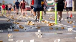 MIKE SUDOMA / WINNIPEG FREE PRESS
Empty water cups and sponges litter the shoulder of Pembina highway as runners make their towards the University of Manitoba in the heat during the Manitoba Marathon Sunday morning. The race was officially stopped because of heat concerns, but many runners continued on with the race.