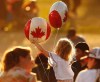 JOHN WOODS / WINNIPEG FREE PRESS
A child plays with balloons during Canada Day celebrations at The Forks in 2019. (John Woods / Winnipeg Free Press files)