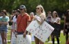 Community members gather to protest the U.S. Supreme Court's overturning of Roe v. Wade and Kentucky's trigger law to ban abortion, at Circus Square Park in Bowling Green, Ky., on Saturday, June 25, 2022. (Grace Ramey/Daily News via AP)