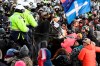 Protesters react as Toronto Police mounted unit charge to disperse as police take action to put an end to a protest, which started in opposition to mandatory COVID-19 vaccine mandates and grew into a broader anti-government demonstration and occupation, in Ottawa, Friday, Feb. 18, 2022. The commissioner of the inquiry examining Ottawa's use of the Emergencies Act to bring an end to the so-called 