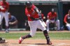 Cleveland Guardians designated hitter Franmil Reyes hits a one-run double against the Minnesota Twins during the first inning in the first baseball game of a doubleheader, Tuesday, June 28, 2022, in Cleveland. (AP Photo/Ron Schwane)