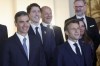 Spain's Prime Minister Pedro Sanchez, left, France's President Emmanuel Macron, Canada's Prime Minister Justin Trudeau, center left, Germany's Chancellor Olaf Scholz, center, Czech Prime Minister Petr Fiala, and Iceland's Prime Minister Katrin Jakobsdottir pose for a group photo with Spain's King Felipe and Queen Letizia and NATO leaders before a gala dinner at the Royal Palace in Madrid, Spain, Tuesday, June 28, 2022. North Atlantic Treaty Organization heads of state will meet for a NATO summit in Madrid from Tuesday through Thursday. THE CANADIAN PRESS/Jonathan Ernst/Pool via AP