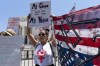 Joanna Liverance, 26, of Detroit, center, protests with abortion-rights supporters outside of the Supreme Court, Wednesday, June 29, 2022, in Washington. (AP Photo/Jacquelyn Martin)