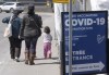 People leave a COVID-19 vaccination clinic, Wednesday, April 6, 2022 in Montreal. Researchers examining the threat of emerging COVID-19 strains predict Omicron BA.5 will account for nearly 70 per cent of cases in much of the country by Canada Day. THE CANADIAN PRESS/Ryan Remiorz