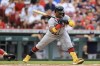 Atlanta Braves' Ronald Acuna Jr. reacts to being hit by a pitch during the first inning the team's baseball game against the Cincinnati Reds in Cincinnati, Friday, July 1, 2022. (AP Photo/Aaron Doster)