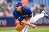 Toronto Blue Jays' starting pitcher Kevin Gausman throws to a Boston Red Sox batter in first inning American League baseball action in Toronto on Monday June 27, 2022.&nbsp;Gausman was helped off the field in the Toronto Blue Jays first game of a doubleheader against the Tampa Bay Rays. THE CANADIAN PRESS/Jon Blacker