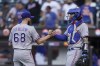 Texas Rangers relief pitcher Joe Barlow (68) celebrates with catcher Jonah Heim, right, after closing the ninth inning of a baseball game against the New York Mets, Saturday, July 2, 2022, in New York. (AP Photo/John Minchillo)