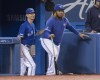 Toronto Blue Jays' Vladimir Guerrero Jr., right, pretends to coach with first base coach Mark Budzinski in the sixth inning of their American League MLB baseball game against the Tampa Bay Rays in Toronto on September 28, 2019. THE CANADIAN PRESS/Fred Thornhill
