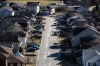 Houses are seen on Squamish Nation land in North Vancouver, B.C., Tuesday, Feb. 22, 2022. Canada Mortgage and Housing Corporation (CMHC) says residential mortgage debt grew by nine per cent last year compared with a year earlier for the fastest pace of growth since 2008. THE CANADIAN PRESS/Darryl Dyck