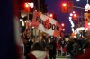 A protester waves a flag saying 