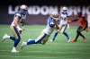 Winnipeg Blue Bombers quarterback Zach Collaros completes a pass to Dalton Schoen, not seen, while falling during the second half of CFL football game against the B.C. Lions in Vancouver, on Saturday, July 9, 2022. Collaros and Schoen of the Blue Bombers and Calgary Stampeders kick-returner Peyton Logan were named the CFL's top performers of the week Tuesday.THE CANADIAN PRESS/Darryl Dyck