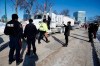 Winnipeg police talk to the lead driver in a convoy of COVID-19 mandate protest trucks as they head home Wednesday, February 23, 2022. Protesters opposing COVID-19 restrictions who blocked off streets in downtown Winnipeg earlier this year cost police nearly half a million dollars.THE CANADIAN PRESS/John Woods