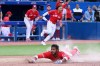 Toronto Blue Jays' Raimel Tapia slides safely into home plate on a walk-off single by Teoscar Hernandez to win the game in the bottom of 10th inning American League baseball action in against the Kansas City Royals Toronto, Saturday, July 16, 2022. THE CANADIAN PRESS/Jon Blacker
