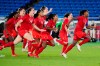 Canada players run onto the field after defeating Sweden in the penalty shootout in the women's soccer final during the summer Tokyo Olympics in Yokohama, Japan on Friday, August 6, 2021. THE CANADIAN PRESS/Frank Gunn