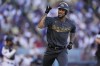 American League's Byron Buxton, of the Minnesota Twins, celebrates after hitting a solo home run during the fourth inning of the MLB All-Star baseball game against the National League, Tuesday, July 19, 2022, in Los Angeles. (AP Photo/Abbie Parr)