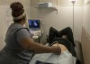 FILE - An operating room technician performs an ultrasound on a patient at Hope Medical Group for Women in Shreveport, La., Wednesday, July 6, 2022. Abortion clinics in Louisiana can continue operating until a lawsuit challenging the state’s near total ban on abortions is resolved, a state judge ruled Thursday, July 21, 2022. (AP Photo/Ted Jackson, File)