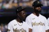 National League second baseman Jazz Chisholm Jr., left, and pitcher Sandy Alcantara, both of the Miami Marlins, are introduced prior to the MLB All-Star baseball game against the American League, Tuesday, July 19, 2022, in Los Angeles. (AP Photo/Mark J. Terrill)