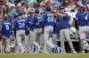 The Toronto Blue Jays celebrate after defeating the Boston Red Sox in a baseball game, Saturday, July 23, 2022, in Boston. (AP Photo/Michael Dwyer)